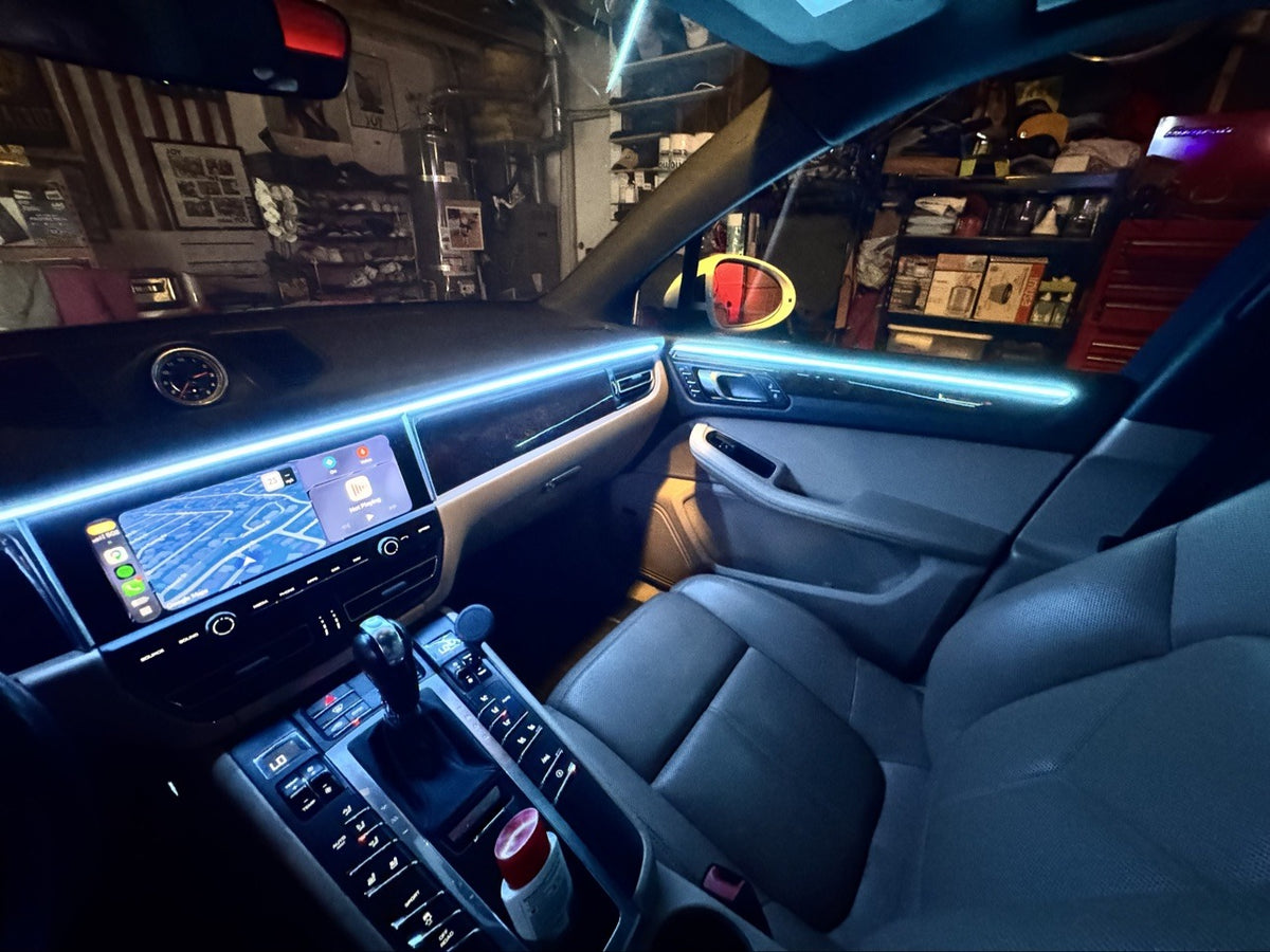 Porsche Macan ambient lighting kit installed - dashboard and passenger door