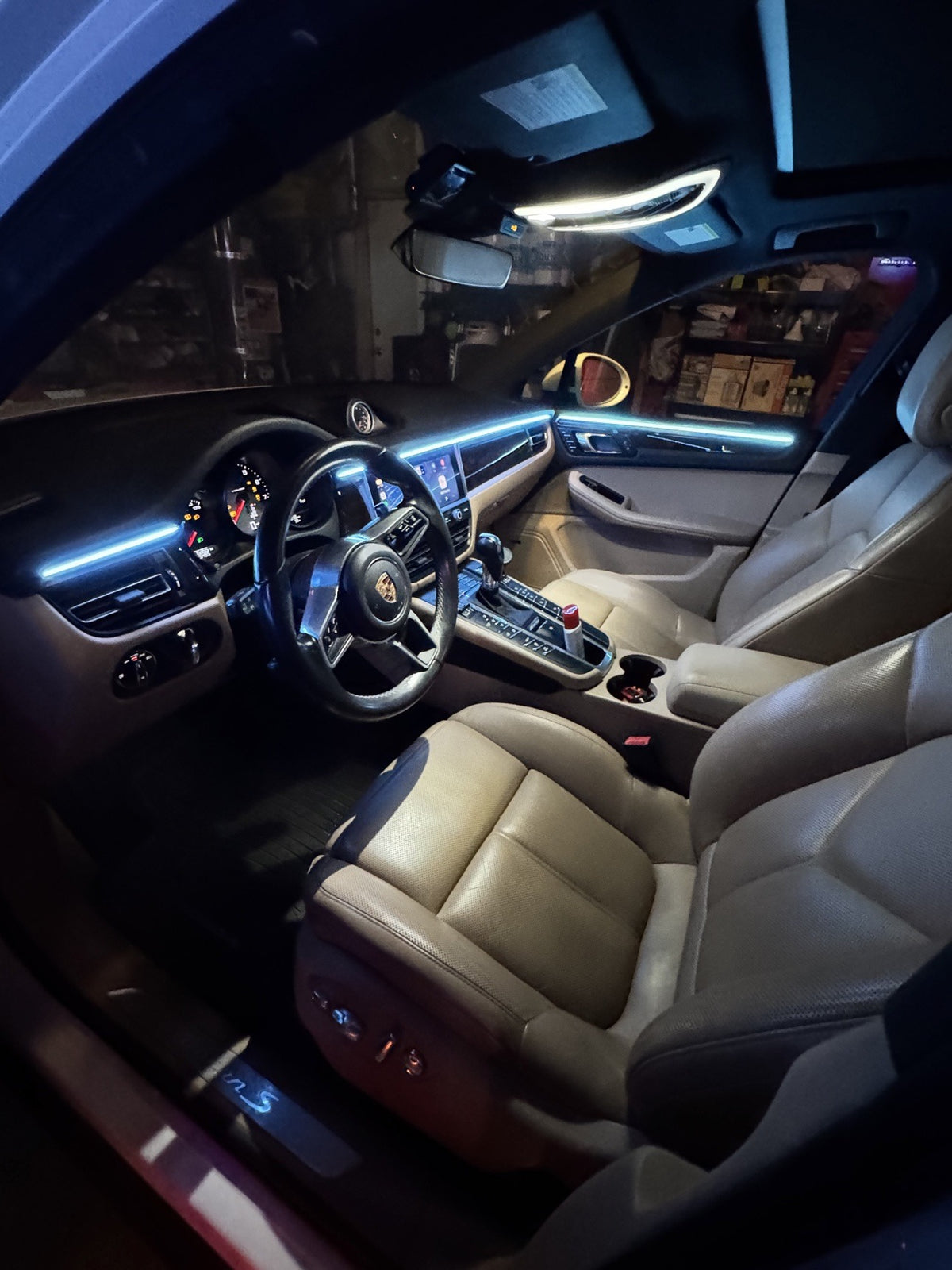 Porsche Macan ambient lighting kit installed - driver cabin at night